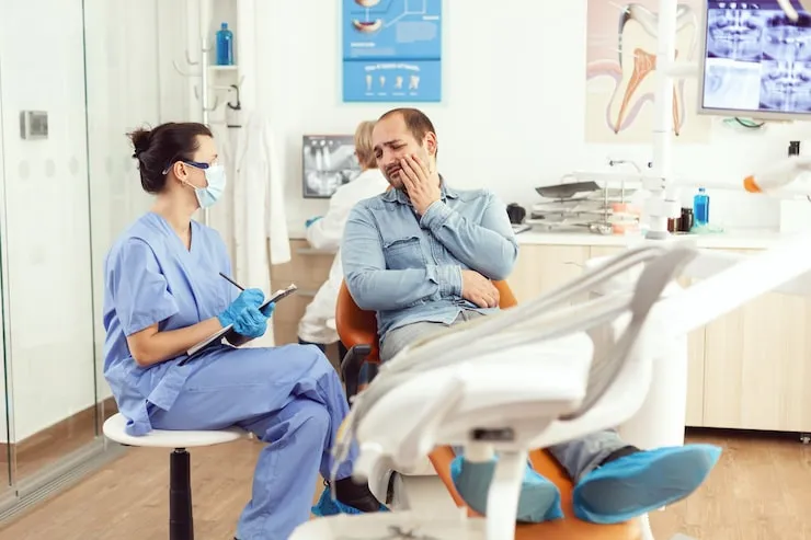 wisdom tooth infection signs symptoms treatment